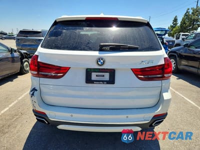 Zdjęcie 6 z 13 samochodu: 2018 BMW X5 SDRIVE35I VIN:5UXKR2C5XJ0X10069 - miniatura