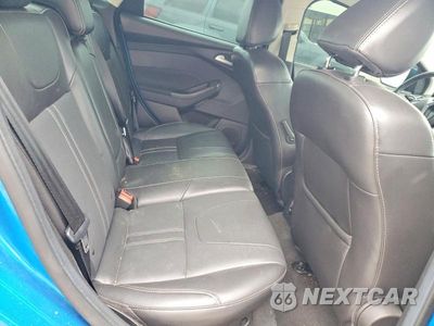 Zdjęcie 10 z 12 samochodu: 2014 FORD FOCUS TITANIUM VIN:1FADP3J26EL349528 - miniatura