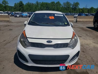 Piąte zdjęcie samochodu w środku: 2012 KIA RIO LX VIN:KNADM5A30C6015754 - miniatura