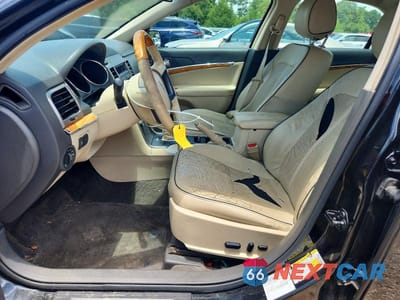Zdjęcie 7 z 12 samochodu: 2012 LINCOLN MKZ VIN:3LNHL2GC9CR825556 - miniatura