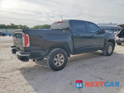 Trzecie zdjęcie samochodu z tyłu: 2016 GMC CANYON VIN:1GTG5BEA7G1209267 - miniatura