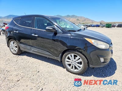 Czwarte zdjęcie samochodu z boku: 2013 HYUNDAI TUCSON LIMITED VIN:KM8JUCAC7DU581428 - miniatura