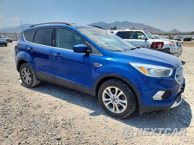 Czwarte zdjęcie samochodu z boku: 2018 FORD ESCAPE SE VIN:1FMCU0GD7JUC90754 - miniatura
