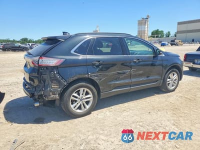 Trzecie zdjęcie samochodu z tyłu: 2015 FORD EDGE SEL VIN:2FMTK4J88FBB22899 - miniatura