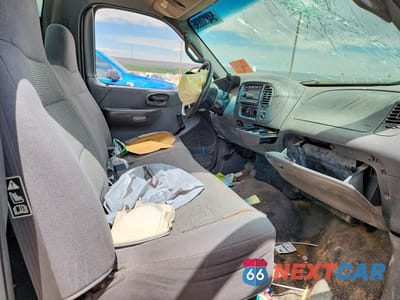 Zdjęcie 10 z 12 samochodu: 2001 FORD F150 VIN:1FTZF172X1NB05037 - miniatura