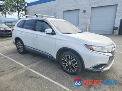 Czwarte zdjęcie samochodu z boku: 2018 MITSUBISHI OUTLANDER SE VIN:JA4AD3A36JZ004788 - miniatura
