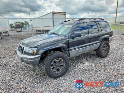 1999 JEEP GRAND CHEROKEE SPORT 1J4GW58S6XC587386 - główne zdjęcie licytacji z USA - miniatura