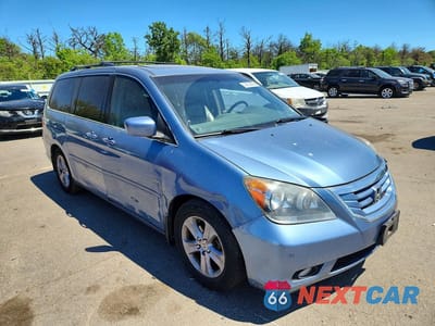 Czwarte zdjęcie samochodu z boku: 2010 HONDA ODYSSEY TOURING VIN:5FNRL3H90AB091017 - miniatura