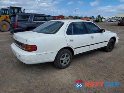 Trzecie zdjęcie samochodu z tyłu: 1992 TOYOTA CAMRY DLX VIN:JT2SK11EXN0029671 - miniatura