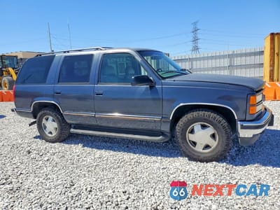 Czwarte zdjęcie samochodu z boku: 1997 GMC YUKON VIN:1GKEK13R9VJ754729 - miniatura