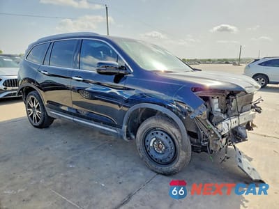 Czwarte zdjęcie samochodu z boku: 2022 HONDA PILOT TOURING VIN:5FNYF5H60NB030745 - miniatura