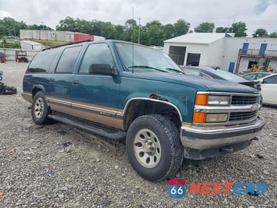 Czwarte zdjęcie samochodu z boku: 1997 CHEVROLET SUBURBAN VIN:1GNFK16R8VJ409212 - miniatura