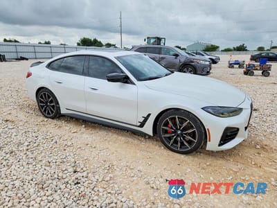 Czwarte zdjęcie samochodu z boku: 2022 BMW M440XI GRAN COUPE VIN:WBA13AW0XNFM45758 - miniatura