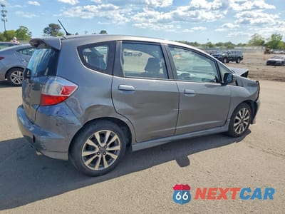 Trzecie zdjęcie samochodu z tyłu: 2013 HONDA FIT SPORT VIN:JHMGE8H52DC074828 - miniatura