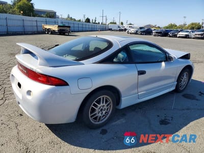 Trzecie zdjęcie samochodu z tyłu: 1999 MITSUBISHI ECLIPSE GS VIN:4A3AK44Y4XE056507 - miniatura