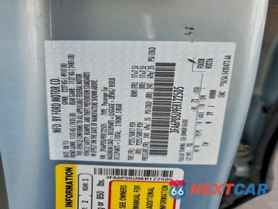 Zdjęcie 12 z 12 samochodu: 2014 FORD FUSION TITANIUM PHEV VIN:3FA6P0SU9ER122505 - miniatura