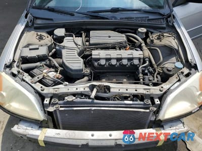Zdjęcie 11 z 12 samochodu: 2002 HONDA CIVIC LX VIN:2HGES16502H527450 - miniatura