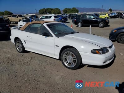 Czwarte zdjęcie samochodu z boku: 1997 FORD MUSTANG GT VIN:1FALP45X0VF153588 - miniatura