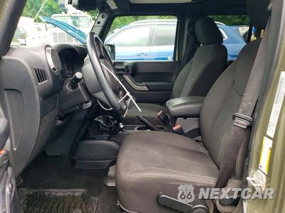 Zdjęcie 7 z 12 samochodu: 2016 JEEP WRANGLER UNLIMITED SPORT VIN:1C4BJWDG3GL107939 - miniatura