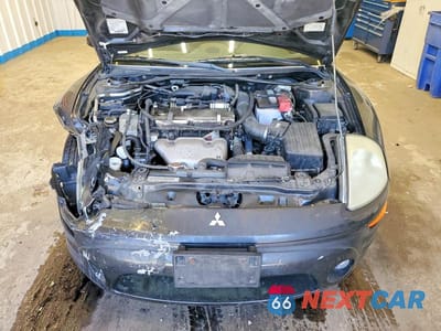 Zdjęcie 11 z 12 samochodu: 2003 MITSUBISHI ECLIPSE SPYDER GS VIN:4A3AE45GX3E202545 - miniatura