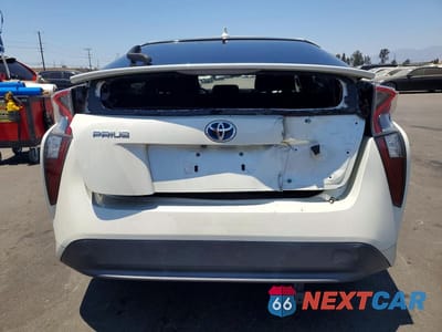 Zdjęcie 6 z 12 samochodu: 2017 TOYOTA PRIUS TWO VIN:JTDKBRFUXH3553945 - miniatura