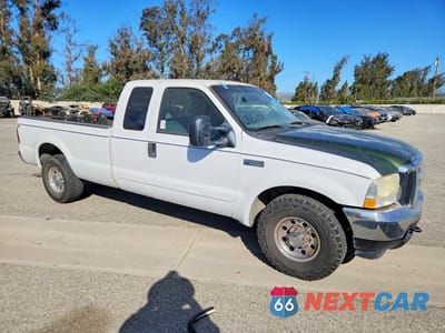 Czwarte zdjęcie samochodu z boku: 2003 FORD F250 SUPER DUTY VIN:1FTNX20LX3EB32973 - miniatura