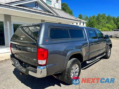 Czwarte zdjęcie samochodu z boku: 2016 TOYOTA TACOMA SR5 V6 VIN:3TMDZ5BN7GM001408 - miniatura