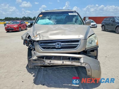 Piąte zdjęcie samochodu w środku: 2004 HONDA PILOT EXL VIN:2HKYF18614H618453 - miniatura
