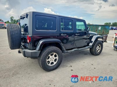 Trzecie zdjęcie samochodu z tyłu: 2016 JEEP WRANGLER UNLIMITED SAHARA VIN:1C4BJWEG7GL162814 - miniatura