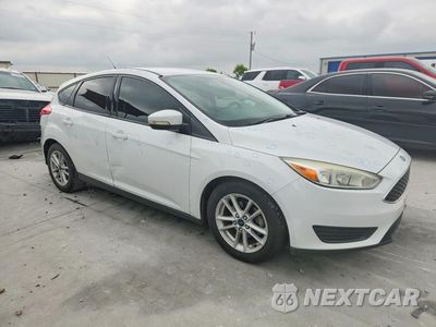 Czwarte zdjęcie samochodu z boku: 2017 FORD FOCUS VIN:1FADP3K22HL231463 - miniatura