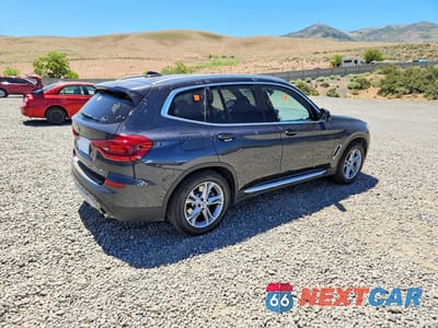 Trzecie zdjęcie samochodu z tyłu: 2021 BMW X3 XDRIVE30E VIN:5UXTS1C04M9G84191 - miniatura