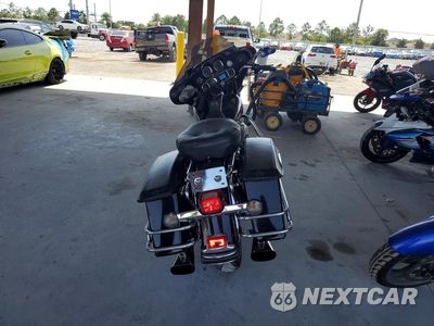Czwarte zdjęcie samochodu z boku: 2006 HARLEY-DAVIDSON FLHT VIN:1HD1DDV106Y679259 - miniatura