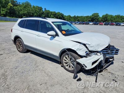 Czwarte zdjęcie samochodu z boku: 2018 VOLKSWAGEN TIGUAN SE VIN:3VV3B7AX9JM090888 - miniatura