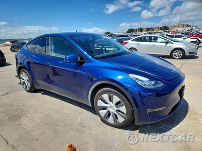Czwarte zdjęcie samochodu z boku: 2023 TESLA MODEL Y VIN:7SAYGDEE6PA148160 - miniatura