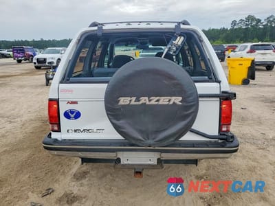 Zdjęcie 6 z 13 samochodu: 1993 CHEVROLET BLAZER S10 VIN:1GNCS13W1P2126760 - miniatura