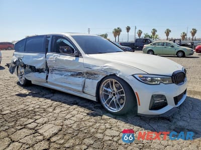 Czwarte zdjęcie samochodu z boku: 2021 BMW 330I VIN:3MW5R1J09M8C15904 - miniatura