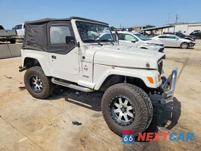 Czwarte zdjęcie samochodu z boku: 1997 JEEP WRANGLER / TJ SE VIN:1J4FY29P6VP440618 - miniatura