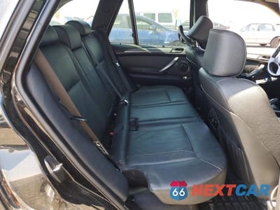 Zdjęcie 11 z 13 samochodu: 2004 BMW X5 4.8IS VIN:5UXFA93574LE81521 - miniatura