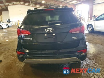 Zdjęcie 6 z 13 samochodu: 2018 HYUNDAI SANTA FE SPORT 2.4L VIN:5NMZUDLB2JH087904 - miniatura