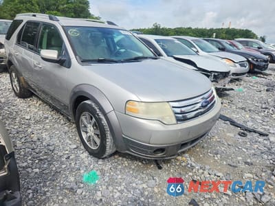 Czwarte zdjęcie samochodu z boku: 2008 FORD TAURUS X SEL VIN:1FMDK02WX8GA35642 - miniatura