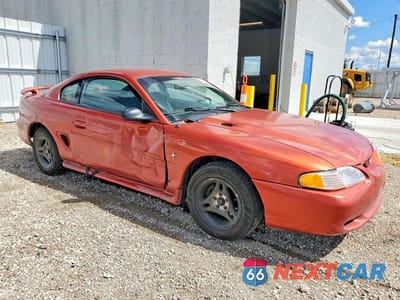 Czwarte zdjęcie samochodu z boku: 1997 FORD MUSTANG VIN:1FALP4047VF195897 - miniatura