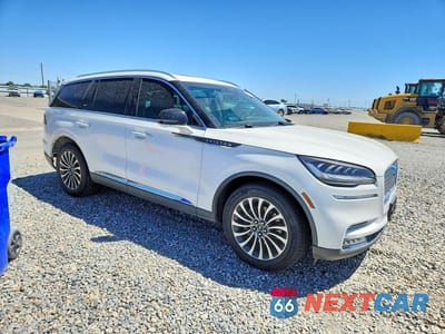 Czwarte zdjęcie samochodu z boku: 2020 LINCOLN AVIATOR RESERVE VIN:5LM5J7XC8LGL37483 - miniatura