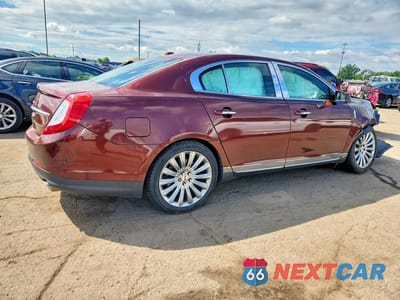 Trzecie zdjęcie samochodu z tyłu: 2015 LINCOLN MKS VIN:1LNHL9EK3FG604968 - miniatura