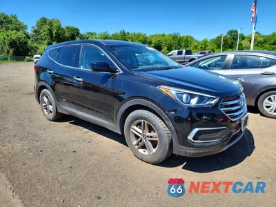 Czwarte zdjęcie samochodu z boku: 2018 HYUNDAI SANTA FE SPORT 2.4L VIN:5NMZT3LB2JH084420 - miniatura