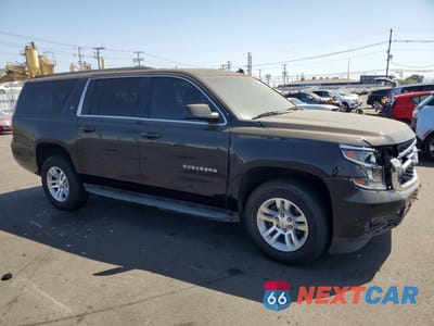 Czwarte zdjęcie samochodu z boku: 2015 CHEVROLET SUBURBAN C1500 LS VIN:1GNSCHKC0FR156816 - miniatura