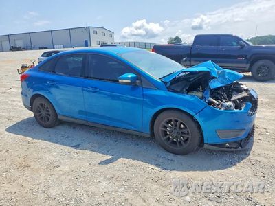 Czwarte zdjęcie samochodu z boku: 2015 FORD FOCUS SE VIN:1FADP3F23FL271140 - miniatura