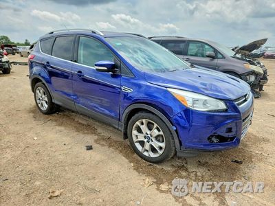 Czwarte zdjęcie samochodu z boku: 2015 FORD ESCAPE TITANIUM VIN:1FMCU9J93FUA43084 - miniatura