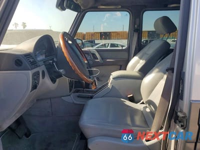 Zdjęcie 7 z 13 samochodu: 2002 MERCEDES-BENZ G 500 BRABUS VIN:WDCYR49E62X128102 - miniatura
