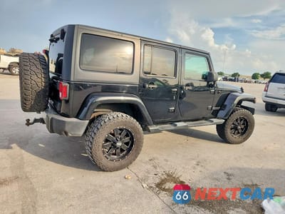Trzecie zdjęcie samochodu z tyłu: 2014 JEEP WRANGLER UNLIMITED SAHARA VIN:1C4BJWEG9EL305419 - miniatura