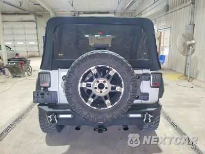 Zdjęcie 6 z 13 samochodu: 2013 JEEP WRANGLER UNLIMITED SAHARA VIN:1C4BJWEG1DL601775 - miniatura